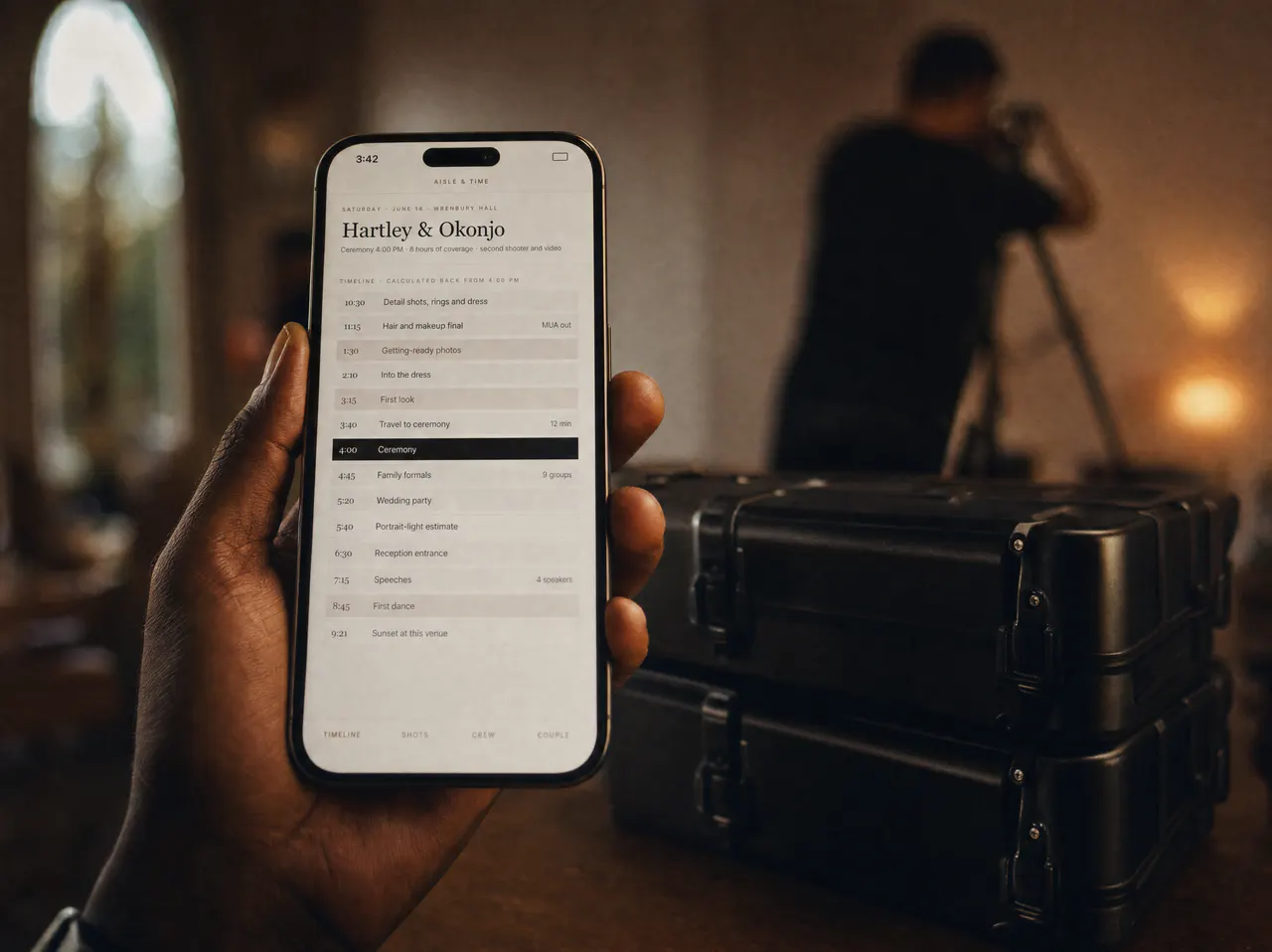 Hands holding a phone showing the coverage timeline, with gear cases in a church aisle.