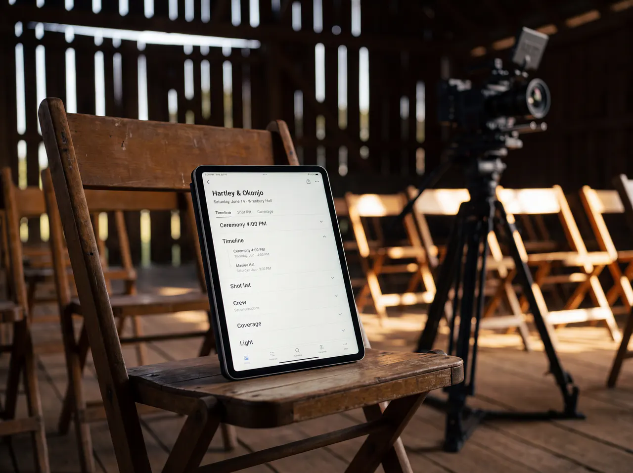 A tablet standing on a wooden chair at an outdoor set, showing the coverage timeline.
